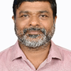 T. John Tharakan